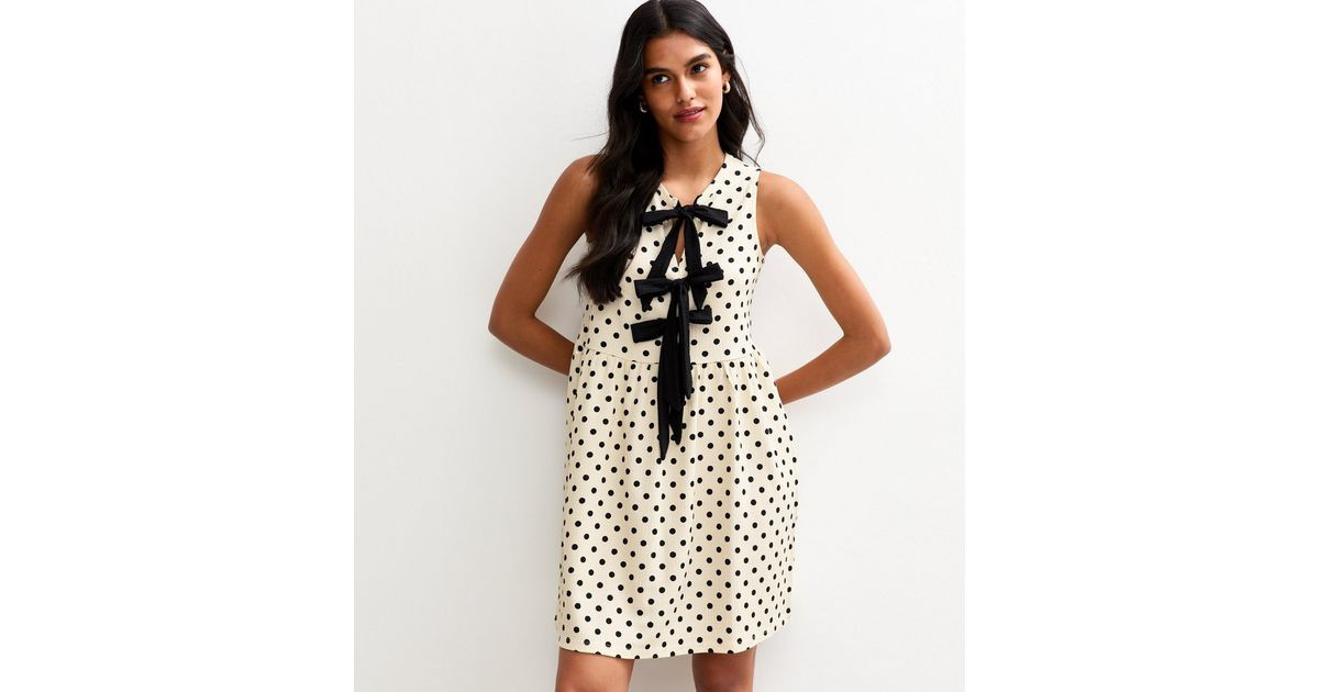 Cream Textured Polka Dot Tie Front Mini Dress | New Look | New Look (UK)