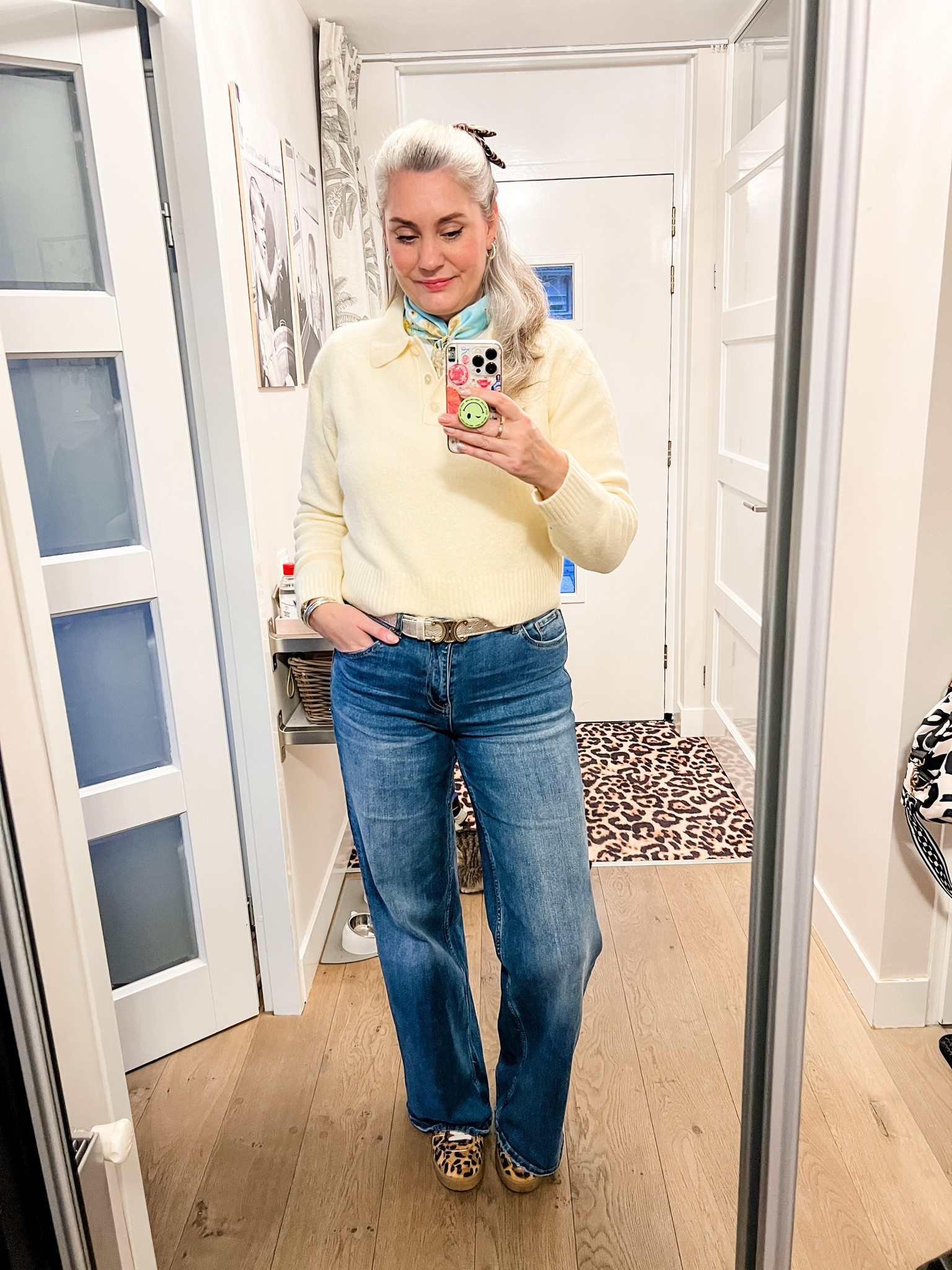 Ootd - Monday. Light yellow polo neck jumper (Primark), Celine belt, wide leg jeans (Shoeby), leopard sneakers and bow. Turquoise and yellow satin scarf. 



#LTKnederlands #LTKFashionMonth #LTKeurope