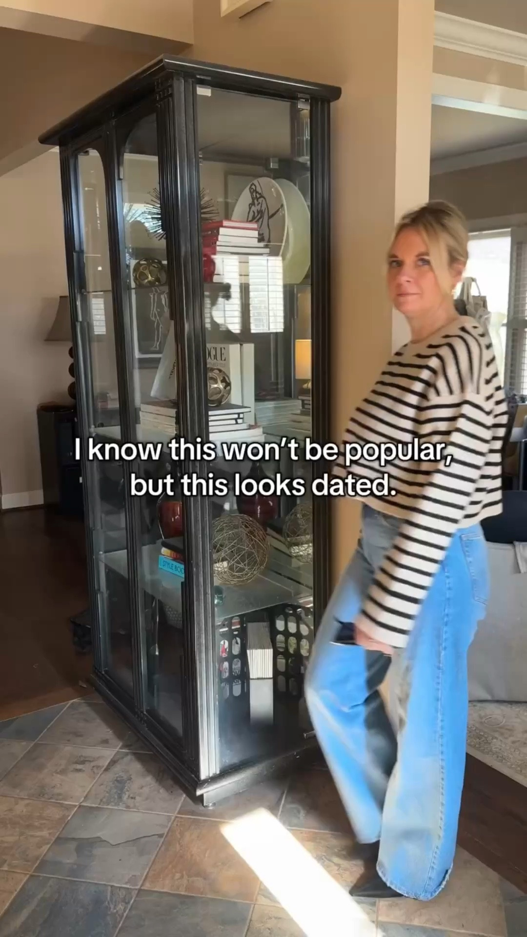 Skinny jeans aren’t the issue — how they’re being styled is. 

When ultra-skinny, ankle-length jeans stop right above the boot, the outfit gets stuck in a very specific era. The cropped break + tight silhouette + short boot combo is what dates the look, not the denim itself. 

Modern winter outfits usually work better with: 
• a longer hem 
• a wider leg 
• or a boot that visually connects to the pant 

This is one of those small tweaks that instantly makes outfits feel current again — without buying a whole new wardrobe.