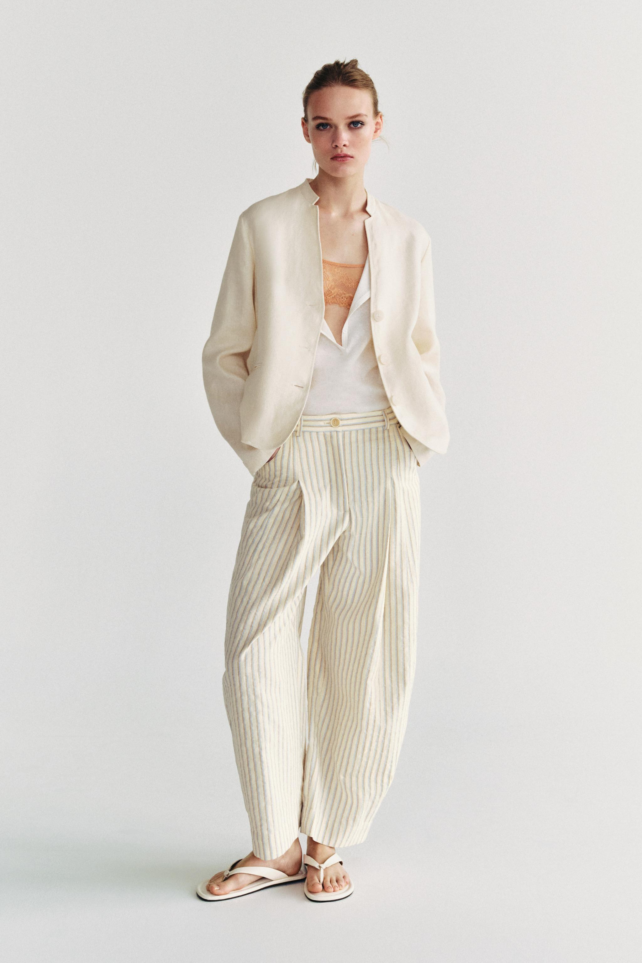 DescriptionContentsMeasurementsZARA WOMAN COLLECTIONTrousers made from a cotton blend yarn. Mid-r... | Zara US
