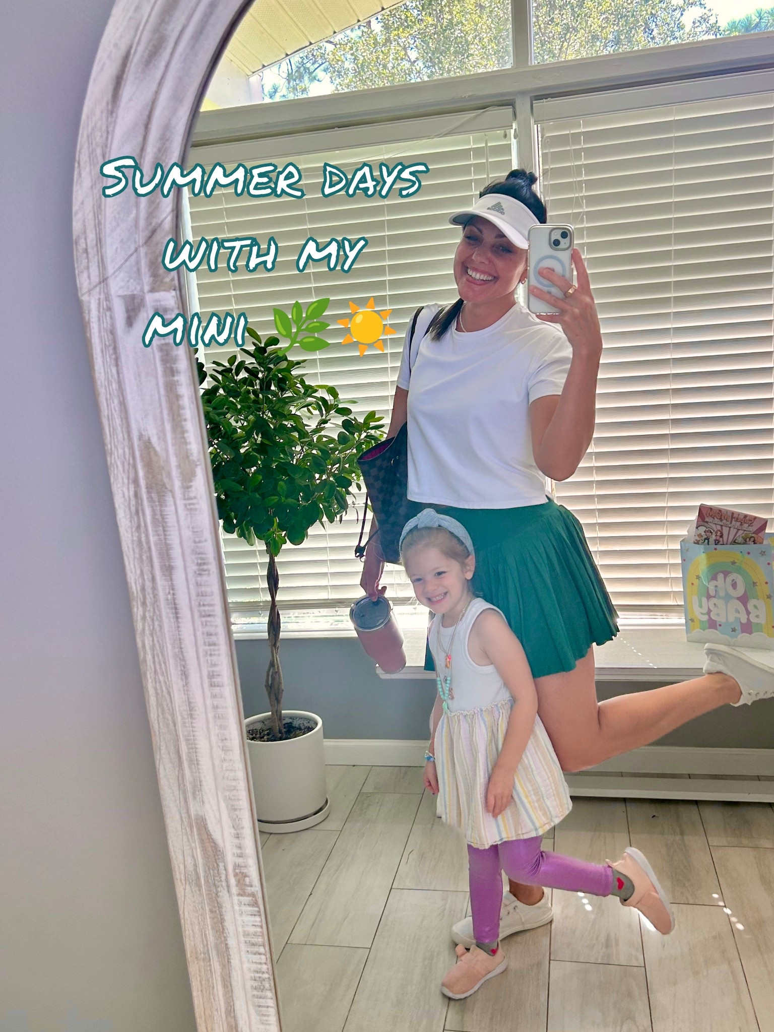 Summer days with my mini ☀️💚 I’m in my Target green tennis skirt (medium) + Adidas hat, and YETI in hand, while she’s rocking her Target dress, Old Navy leggings, and Target tennis/water shoes. Matching vibes, sunny smiles, and all the little moments! 👒👟🧃 

#LTKKids #LTKSeasonal #LTKFamily