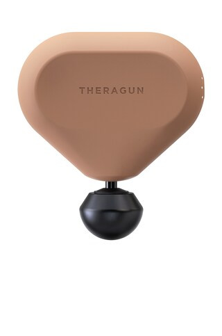 THERABODY Theragun Mini in Desert Rose from Revolve.com | Revolve Clothing (Global)