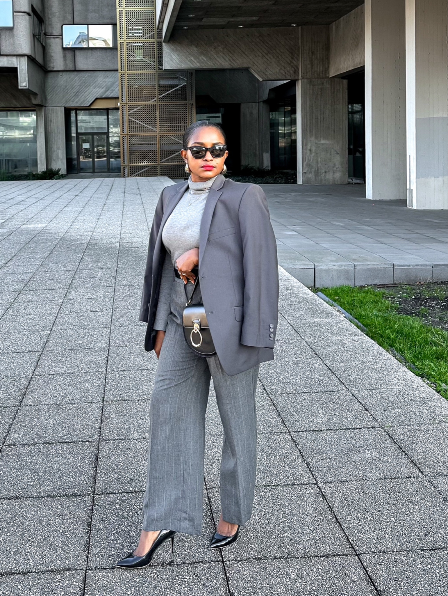 Monochrome Outfit of the day for transitional weather, grey blazer, grey pants, black pumps and crossbody bag.

#LTKworkwear #LTKstyletip #LTKU