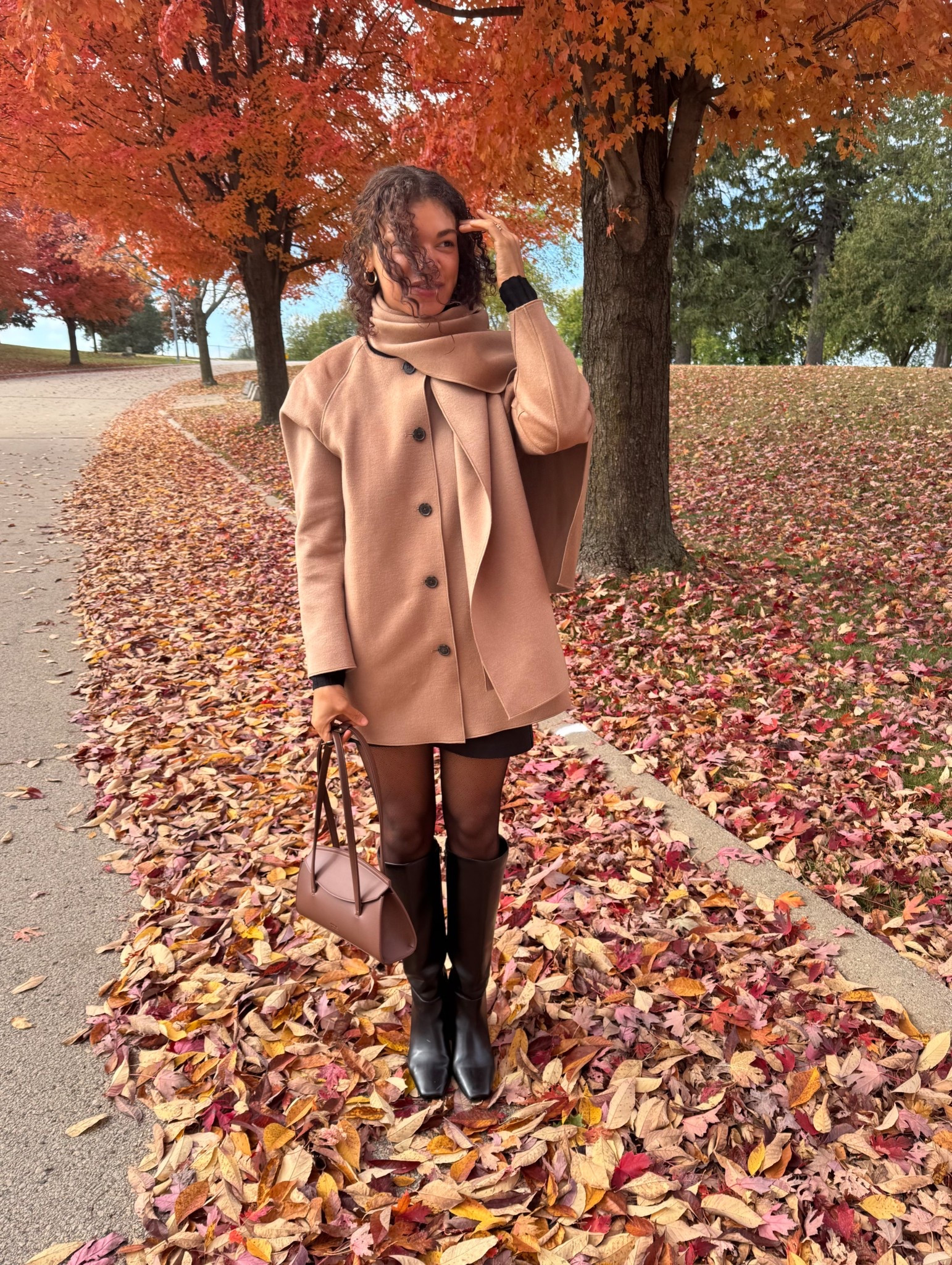 Beautiful scarf wrap coat from J.Crew. Paired it with a turtleneck, mini skirt, sheer tights, handbag, and knee high boots 

#LTKSeasonal #LTKStyleTip