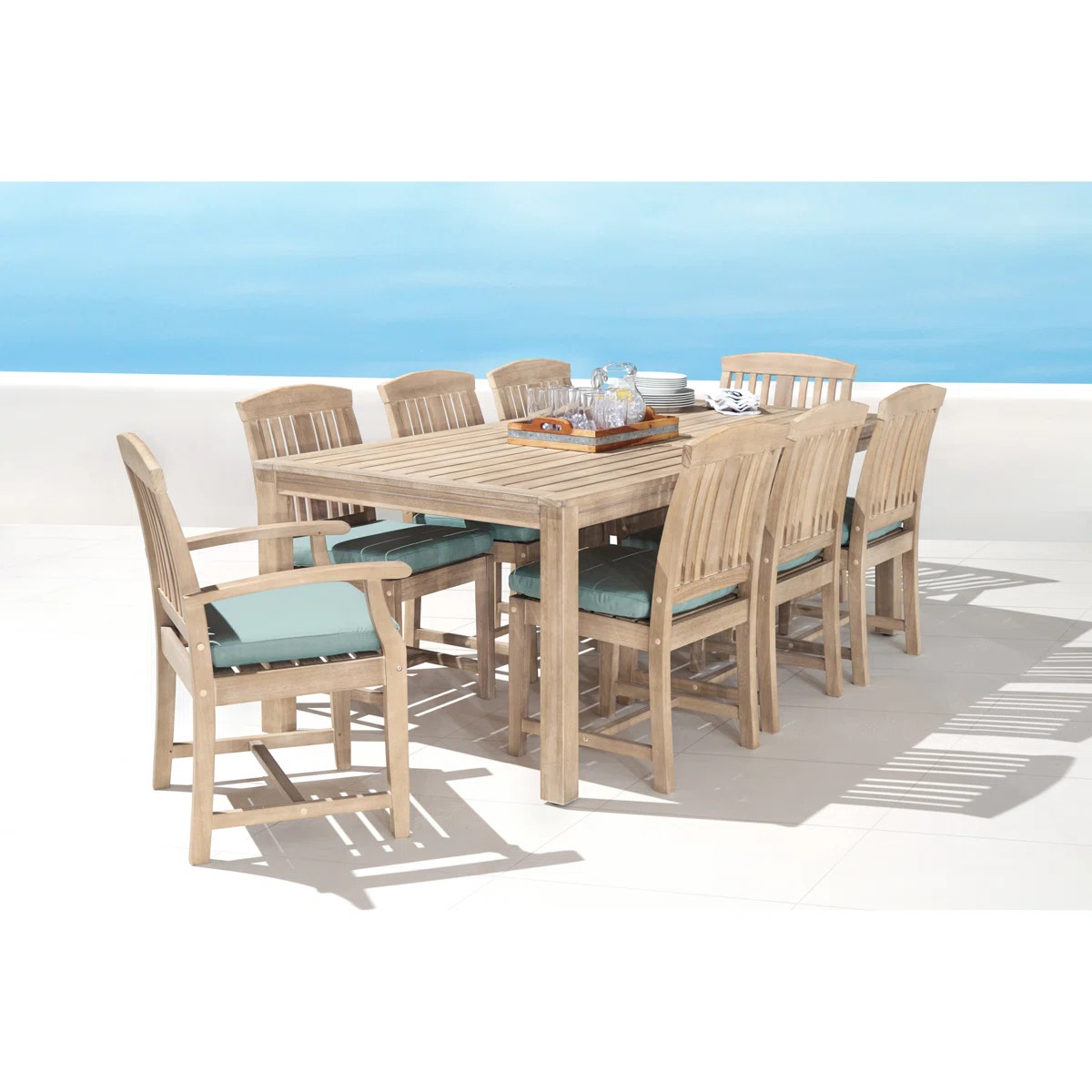 Paulet Rectangular 8 Person Acacia Dining Set With Sunbrella Cushion Covers | Wayfair North America