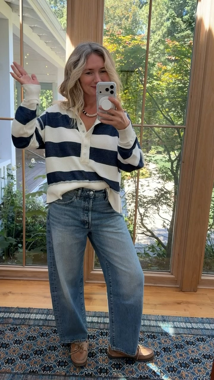 These are very similar to the darted barrel by Madewell, without the darts and in an extremely good vintage wash. The stitching and the fading are perfect and typically done better on really expensive brands (like R19 and Moussy), so I was super impressed with them. They are mid-rise but really flattering (more rigid up top and sit nicely on the hips and don’t cut in too much or bulge out). The rugby sweatshirt is from American Eagle and comes in a lot of colors (and I’ve been living it in at night).

#LTKdayinmylife #LTKootd #LTKOver40