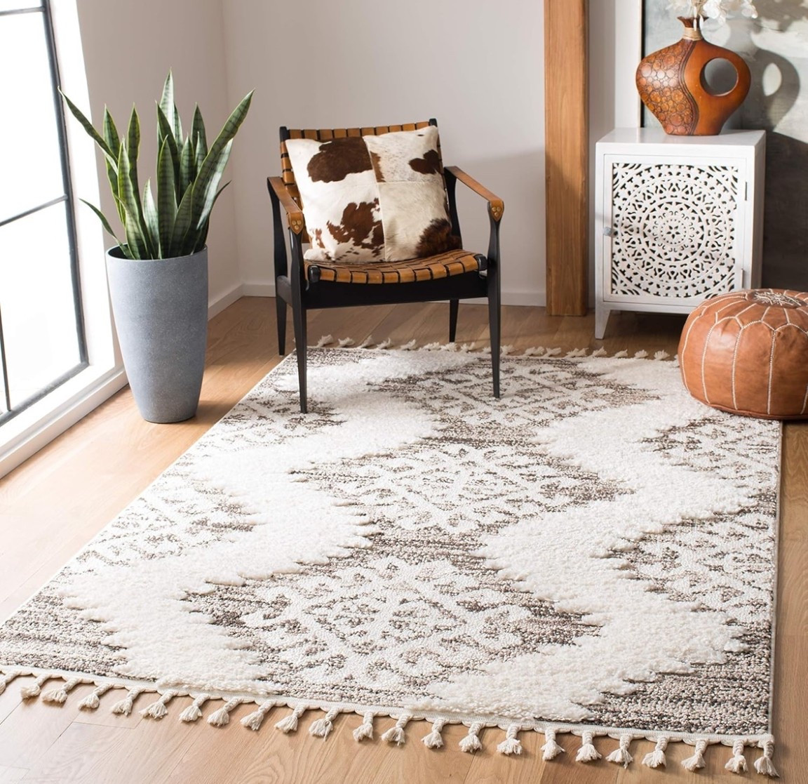 Soft texture, cozy living. ✨ This Moroccan tassel shag rug in ivory and brown adds warmth, depth, and boho charm to any living room, bedroom, or dining space. Plush, inviting, and effortlessly styled. 

Shop now and elevate your space.🤎

#LTKHome #LTKU #LTKSeasonal