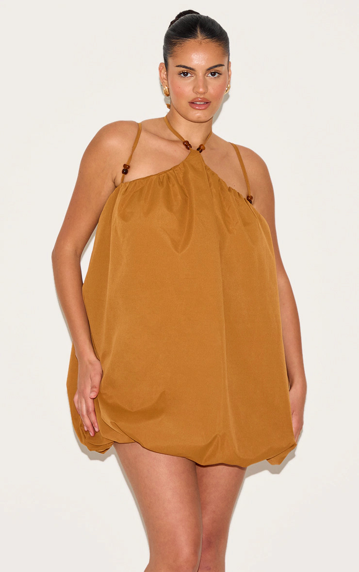 Plus Dark Ochre Halterneck Bead Detail Puffball Dress | PrettyLittleThing US