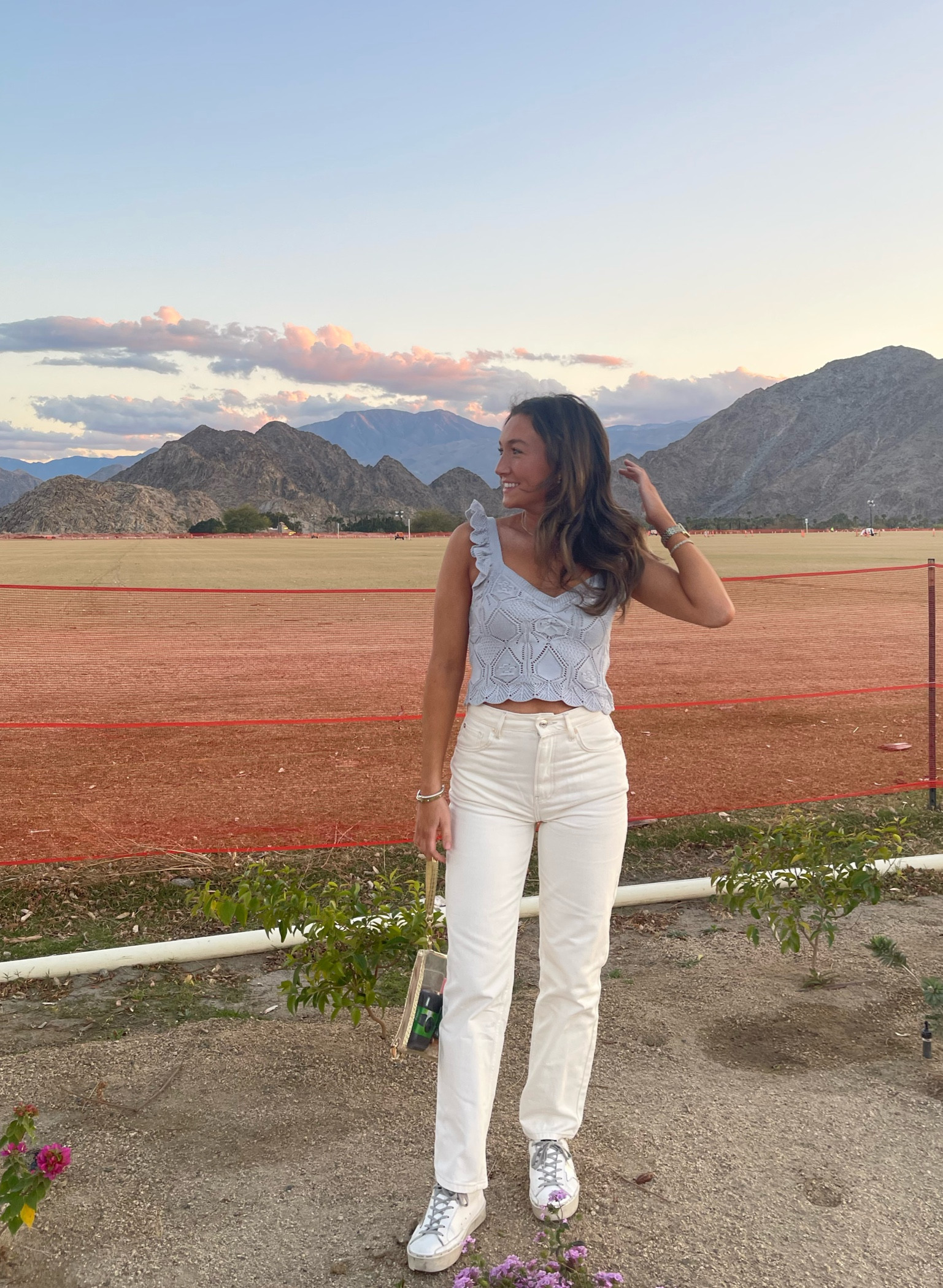 An east vacation outfit idea! Off white jeans paired with the perfect transitional piece a blue crochet tank! White golden goose to bring it all together. 

#LTKSpringSale #LTKtravel #LTKstyletip