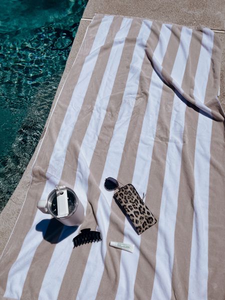 my favorite neutral pool + beach towels are on sale today !! 🤎🐚

#LTKSeasonal #LTKSwim #LTKStyleTip