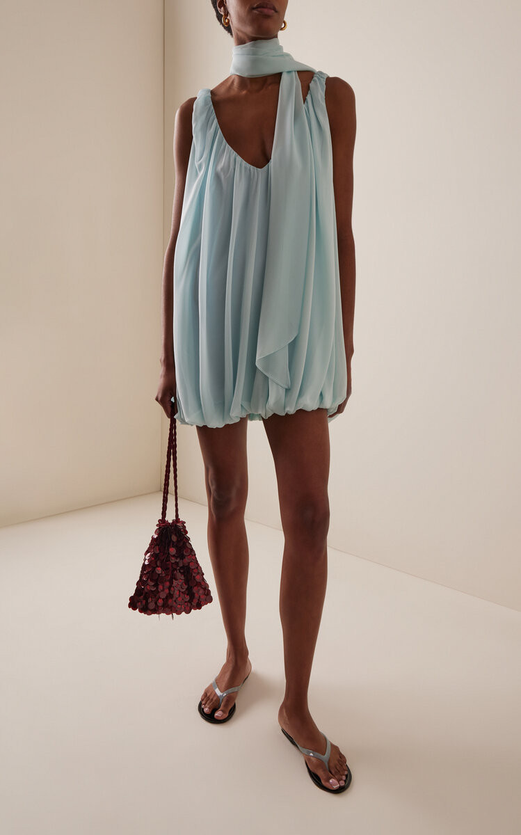 EXCLUSIVE
De La Vali

Exclusive La Isla Isla Chiffon Mini Dress

$600
Color
—
Blue
Size Guide

Select a size

ADD TO BAG

ADD TO FAVORITES
EDITOR'S NOTE
De La Vali is an ode to the design-duo's muse 'Vali Myers', a visionary artist, dancer and bohemian whose extroverted and vivacious way of being captivated all who she encountered. In turn, the label's striking statement pieces are designed for confidence and empowerment when worn.

Made just for us, the 'Isla' mini is made from chiffon that hangs from a scoop neck to a bubble hem. It comes with a scarf for added drama.
PRODUCT DETAILS
This style is part of the Club Moda La Isla exclusive capsule
Pre-Fall '26
Zip fastening
Composition: 100% polyester
Designer color: Turquoise
Dry clean
Imported
Product Code 1074469
SHIPPING & RETURNS
$10.00 Standard Shipping
Ship to:
United States of America

Change
Enter a Zip/Postal Code for a delivery estimate

UPDATE
Item is returnable within 14 days for a full refund, or 30 days for site credit. Learn more.
 | Moda Operandi (Global)