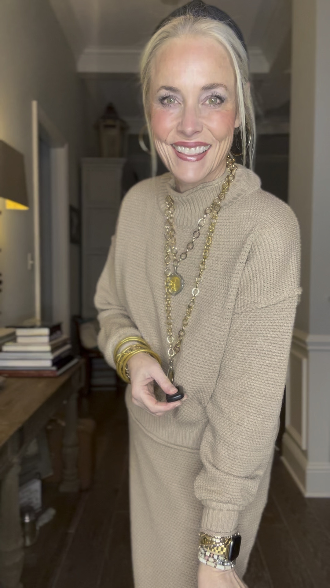 This Free People look for less of the Hailee Sweater Skirt Set from Amazon is TOP NOTCH! The fit is very similar to the real deal and so is the material. The color is a little different, but this one won’t show dirt or stains as easily as the one from FP. This one doesn’t run as big as the FP one, so if you’re not into the really oversized fit, this would also be a good choice for you. This one comes in sizes S-XL, and I’m in a medium.  I’m wearing my taupe suede knee boots from Target, brown fleece-lined sheer looking tights from Amazon for the added warmth needed in December. I finished the look off with my everyday gold jewelry and watch band from Amazon, my personalized bracelet stack from Etsy and my favorite pieces from Jennifer Ponson Designs  

#LTKHoliday #LTKsalealert #LTKGiftGuide