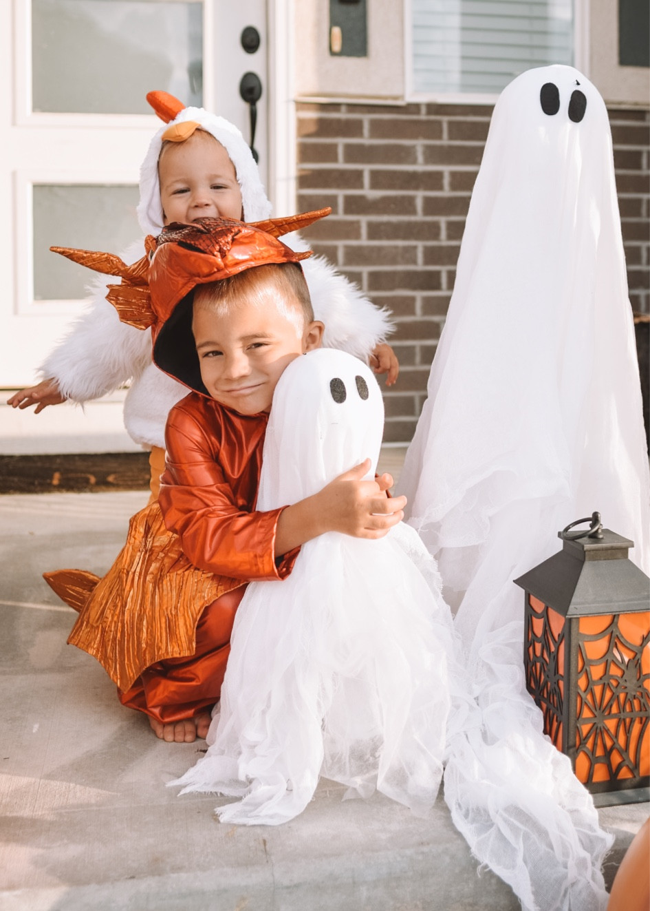 Halloween Front Porch Decor - the cutest pumpkins, Halloween lanterns, hanging witches hats and those little ghosts are so adorable! 

#LTKFamily #LTKHalloween #LTKHome