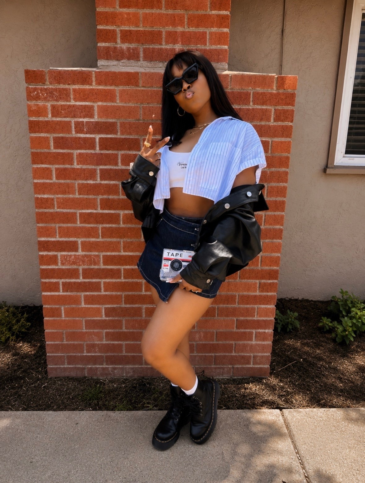 Serving a little sporty street style with a 90s edge ✨

Styled a white terry cloth crop top with an oversized cropped button-up, denim skort, leather jacket, and black Doc Martens for that effortless cool-girl look.

The layered textures mixed with the structured boots give this outfit the perfect balance of casual, edgy, and elevated.

If you love 90s-inspired fashion, casual street style outfits, Doc Martens styling, and effortless everyday looks… this outfit is SUCH a vibe.

Some pieces are from Zara, so I linked similar styles on my LTK ✨

#90sFashion #DocMartensStyle #DenimSkort

#LTKootd