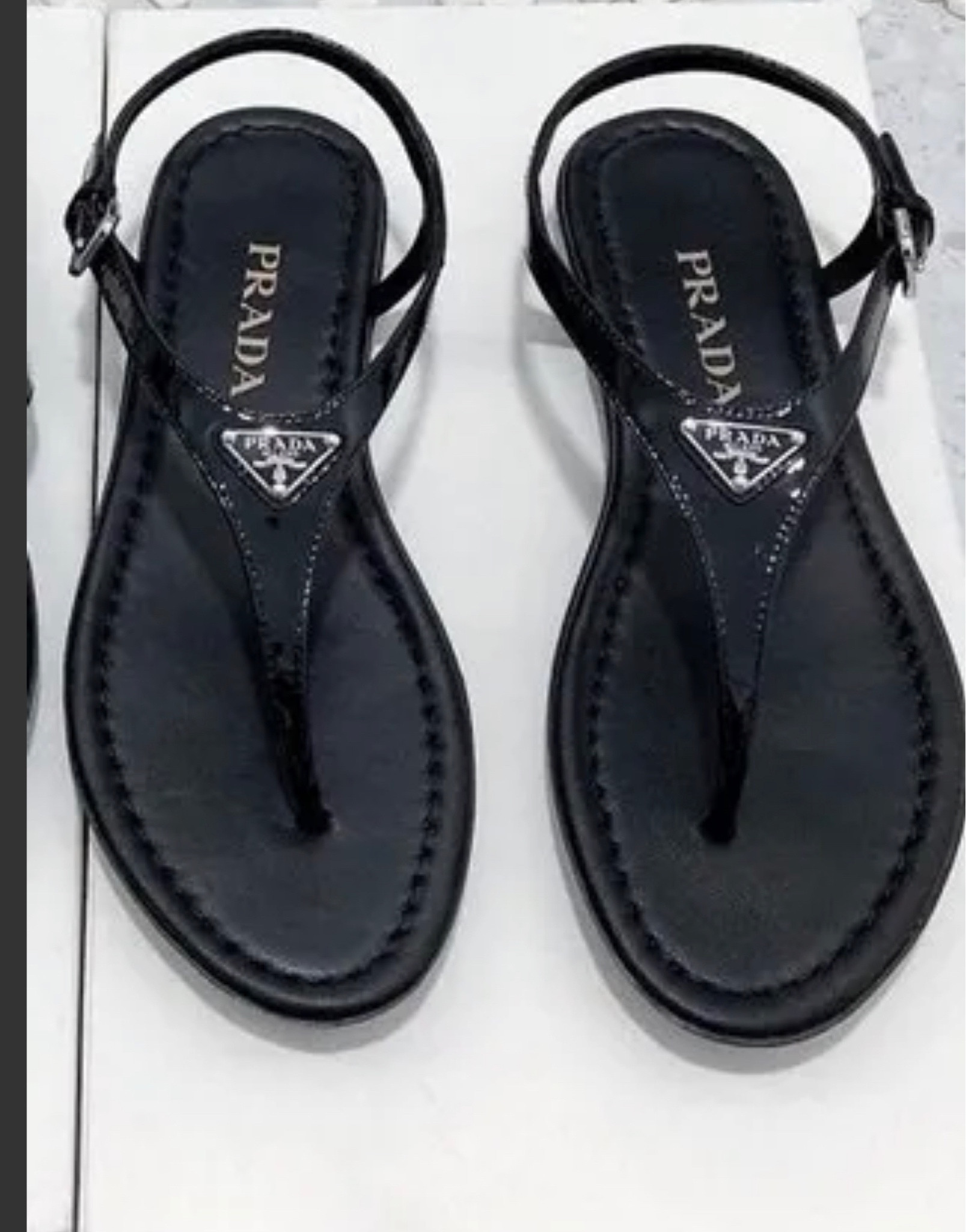 Prada flip hotsell flops womens