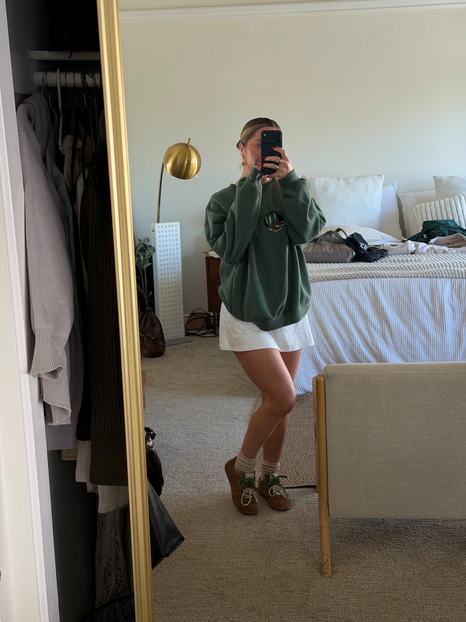 OOTD! Matching the laces on my Steve Madden sneakers to my skirt and sweatshirt 💚

#LTKSeasonal #LTKStyleTip