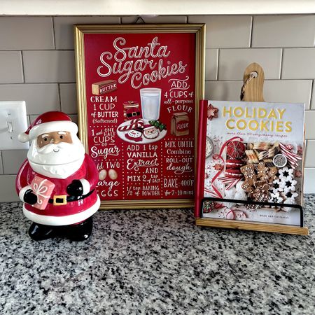Christmas Vignette in the Kitchen ❤️😄🎄 I went with a Christmas Cookie theme in this area. The Santa jar is from Walmart this year, I got the Sugar cookie recipe picture from Michaels last year, and the Holiday Cookie book is from Amazon. The cookbook stand is also from Amazon. 

#LTKHoliday #LTKhome #LTKstyletip