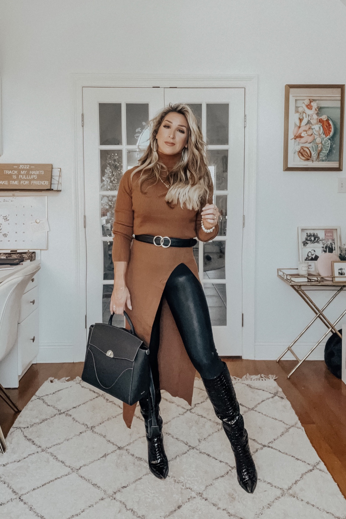 An easy elevated look for December! Faux leather leggings, tall black boots 

#LTKunder100 #LTKstyletip #LTKitbag