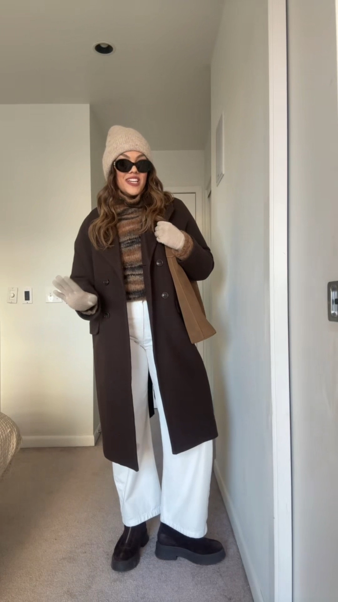 
What I’m wearing on a cold day!

-White barrel jeans, similar linked. 
-Banana Republic brown striped alpaca wool funnel neck sweater, I have a medium. 
-Madewell espresso brown wool coat, I have a size 8. 
-Steve Madden chocolate brown suede zip-up boots. 
-Celine Triomphe sunglasses. 
-Zara beige beanie. 
-Coach suede Brooklyn bag. 

#LTKcanada #LTKwinter #LTKstyletip