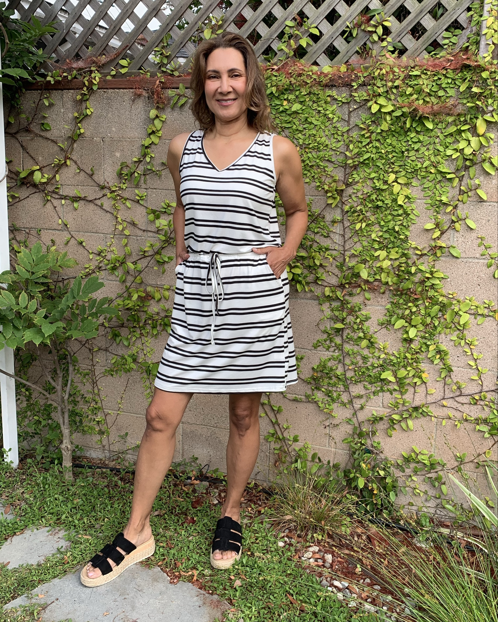 Affordable vacation outfit  options! How cute is this summer dress for mom life, retired life, and running errands? She will definitely be in my suitcase when we head to Tahiti this summer.  I’m wearing size S and I am loving the drawstring waist and super soft fabric.
#LTKSummerEdit

#LTKSeasonal #LTKOver40 #LTKFindsUnder50
