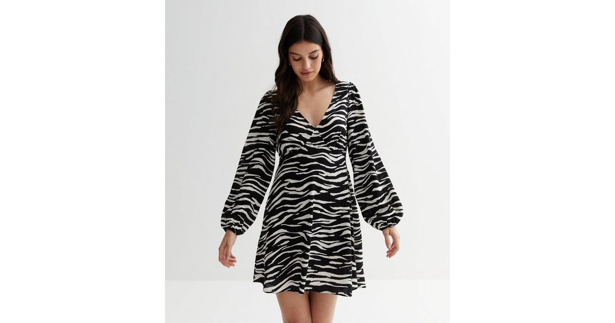 Black Zebra Print V Neck Long Sleeve Mini Dress
						
						Add to Saved Items
						Remove from... | New Look (UK)