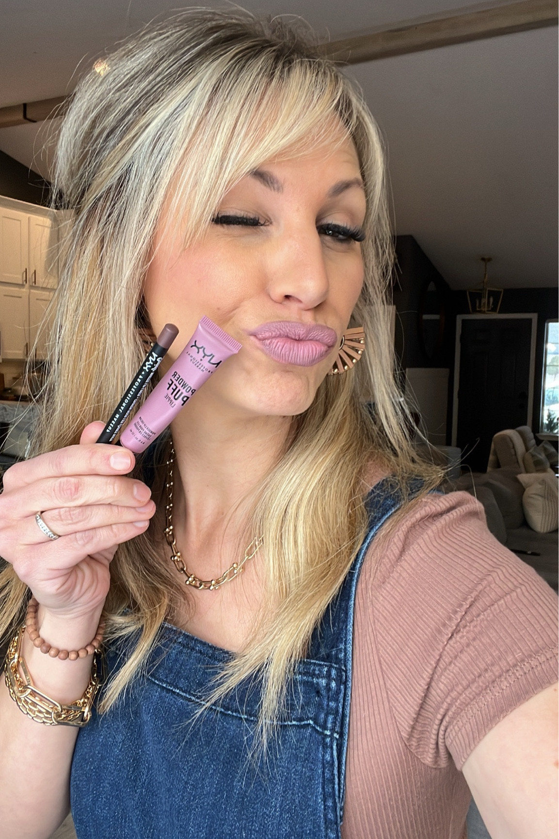 One of my go to lip colors! I use the NYX Matte lip liner in the color Moonwalk and top it off with NYX Powder Puff in the color Will Power. I will often top of off with the a gloss. I will also use the ELF brow liner for my eyebrows as well as a lip liner! 
#lipstick #drugstoremakeup 

#LTKFind 

#LTKbeauty