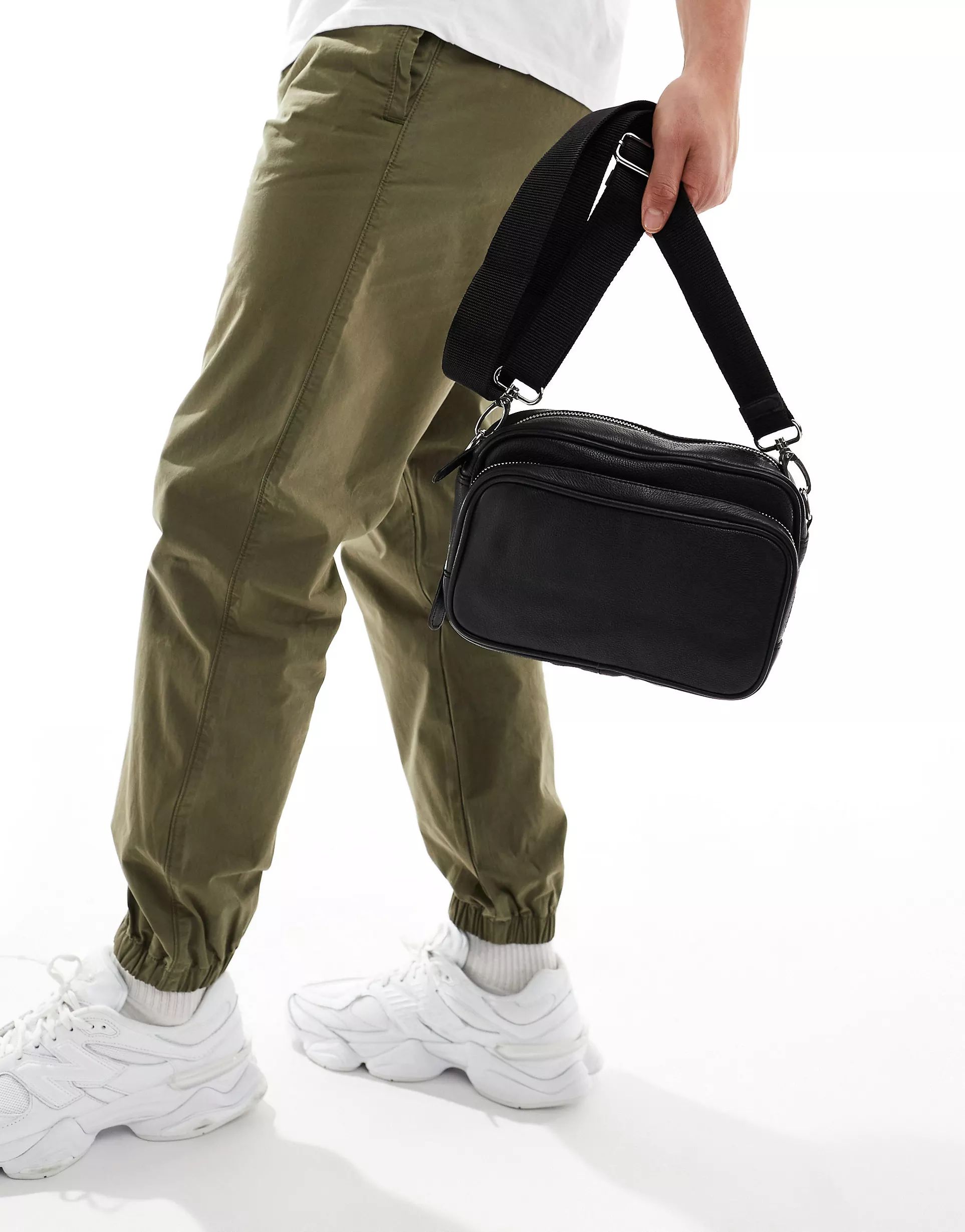 ASOS DESIGN leather crossbody bag with zip pockets in black | ASOS (Global)