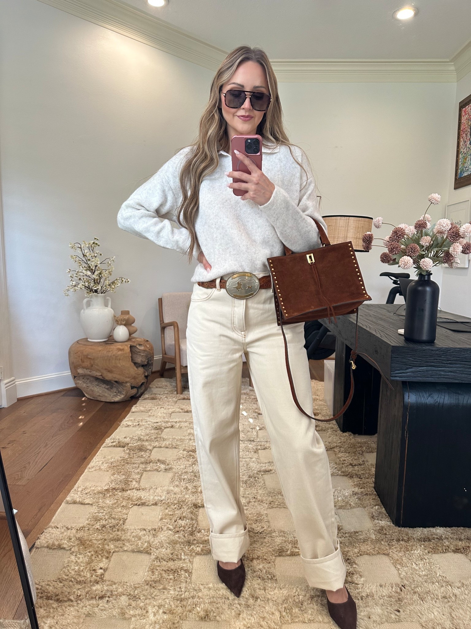 Everything comes together with a good belt! Also these natural color jeans are on sale at Revolve right now. (They are a loose fit, i’m usually at 26 and these are a 26 so go down a size if you don’t want the baggier fit.)

#LTKStyleTip #LTKSeasonal