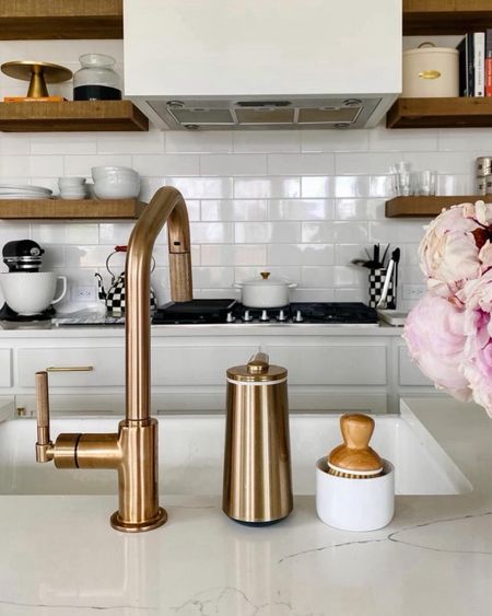 Kitchen accessories and hardware that is simple yet classy in the home. I love the brass look 

#LTKHome #LTKStyleTip