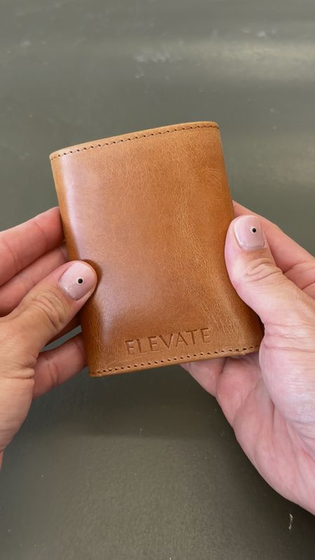 Titus is his name. 💪🏼 @elevate.people

✌🏼 The Titus… the men’s trifold wallet you’ve been asking for! Crafted with durable, full-grain leather, this wallet boasts a classic design that’s built to last. 

👏🏼 Over time, it develops a beautiful patina finish, adding character to its timeless style. With eight card slots and a designated cash spot, it offers both style and functionality. 

🙌🏼Handcrafted by artisans in India, it’s a timeless accessory he’ll cherish for years to come.

👉🏼 8 card slots 
👉🏼 1 spot for cash 
👉🏼 Full grain leather 

#LTKMens #LTKStyleTip #LTKBeauty