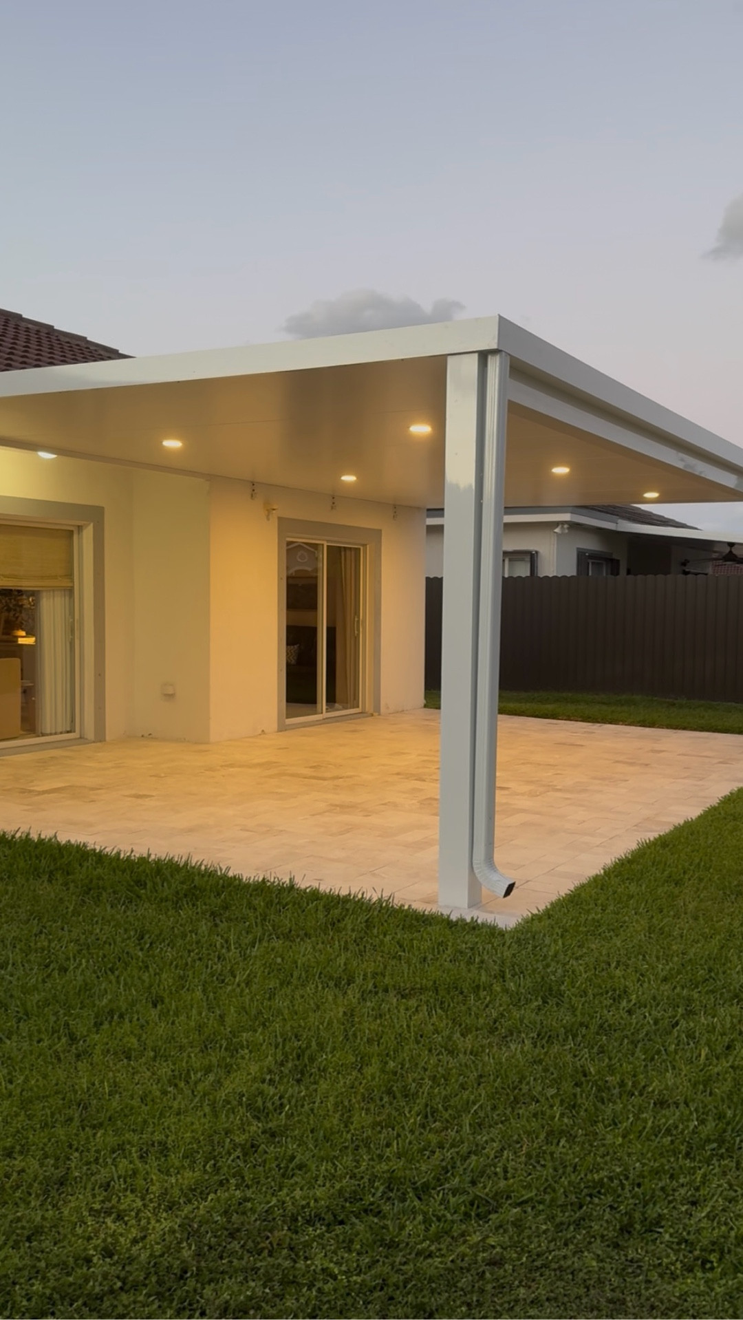 This was our latest home project and I am so happy with it. Just adding the travertine stone and a pergola completely changed the feel of this space it🌟
#pergola #travertine #home-project #lighting 

#LTKSaleAlert #LTKActive #LTKHome