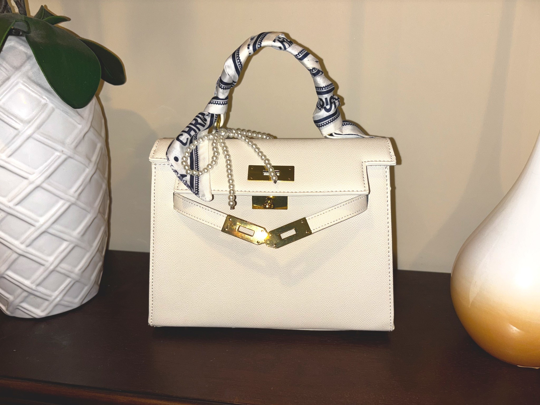 Added a twilly scarf and purse charm to my new Five Below “Kelly."

#LTKFindsUnder50