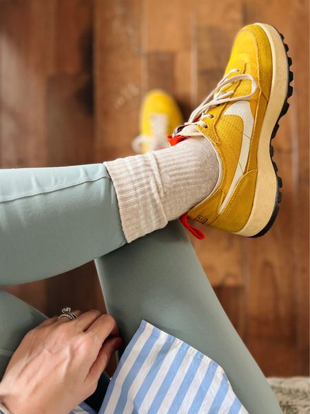Bombas half calf socks - (Hoping for) Spring outfit of the day - favorite lululemon leggings,  yellow sneakers, AYR stripe button down, green Patagonia vest, machete watch band, Clare v oui trucker hat 
❤️ Claire Lately

#LTKfindsunder50 #LTKstyletip #LTKSeasonal
