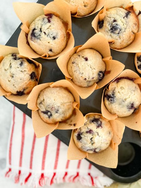 Simple Homemade Blueberry Muffins 
2 cups blueberries (frozen or fresh)
2 cups all purpose flour
2 tsp baking powder
1 cup (plus 2-3 tbsp for sprinkling) sugar
1/4 tsp salt
2 eggs
3/4 cup milk
1/2 cup butter ( French butter 👌🏼)
1 tsp vanilla extract

🫐 Preheat oven to 375 and prep a 12 cup muffin pan with liners ( grabbed these from Walmart)
🫐 Cream the butter some before adding the sugar. I used a fork, but a mixer will also be good!
🫐 After creaming the butter and sugar, add the vanilla and mix. Then mixing in the milk. 
🫐 Add the eggs, one at a time, incorporating the first one in before adding the second egg.
🫐 In a separate bowl, mix the flour, salt, and baking powder.
🫐 Add half the flour mixture to the butter mixture and mix, then add the rest of the flour mixture.
🫐 Mix until everything is just incorporated, then fold in the blueberries. 
🫐 Fill each muffin cup about 3/4 full with the batter, then sprinkle the reserved sugar on top of each one.
🫐 Bake for ~15 minutes or until edges are lightly browning and the middle is set.
🫐 Don’t forget to add that butter slice to the middle 👌🏼

#LTKHome #LTKParties #LTKFamily