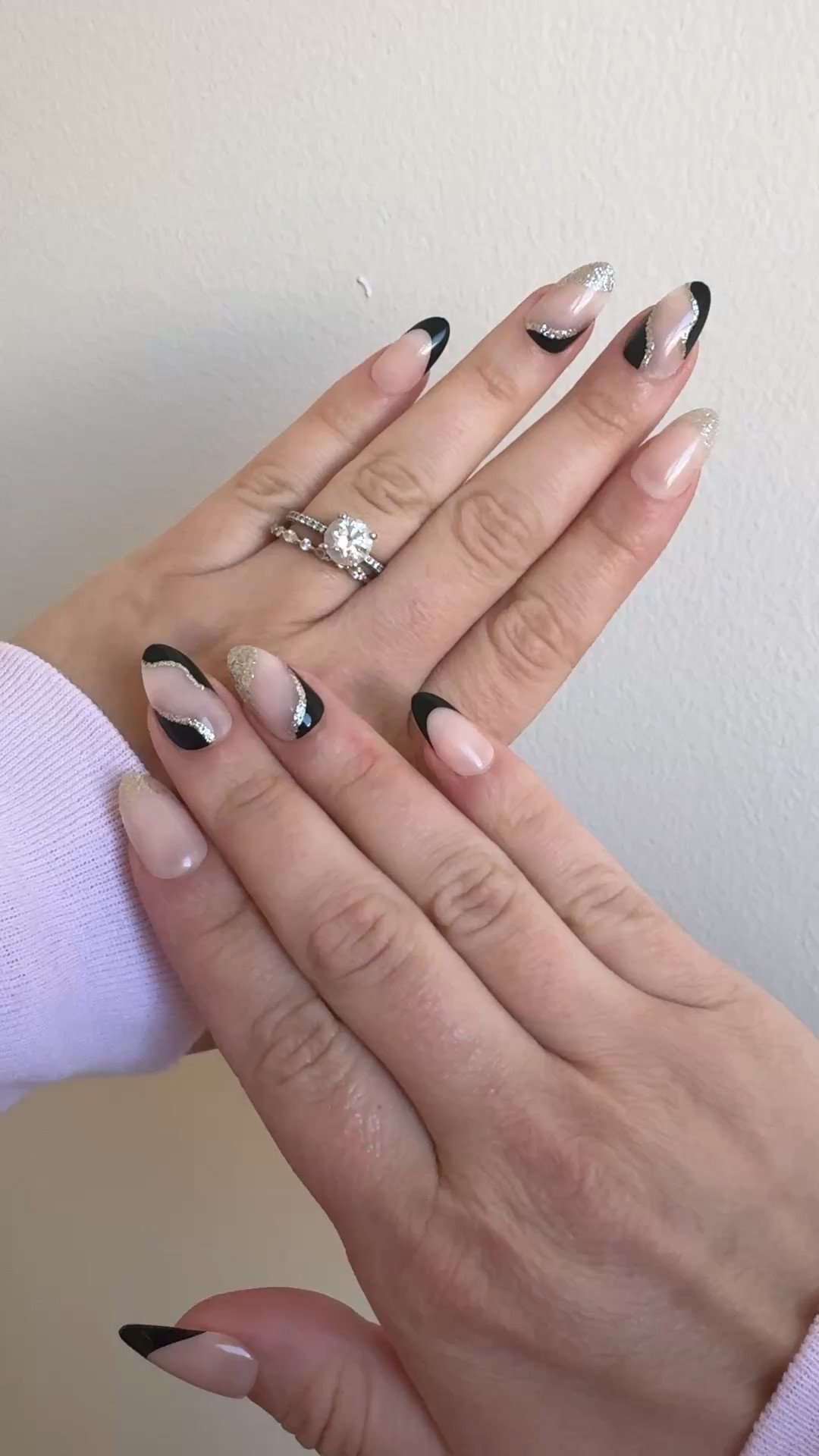 Need some New Year’s Eve nail art inspiration? 💅🏻🥂🎊 These Impress press-on nails are perfect if you didn’t have time to hit the salon before the end of the year. The black and silver glittery nails are so pretty and I love the almond shaped nails right now too.

#LTKOver40 #LTKHoliday #LTKBeauty