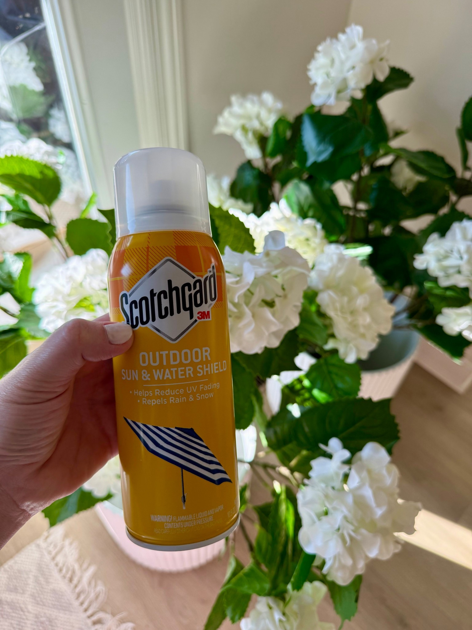 Spring has started and these faux outdoor flowers are getting sprayed to protect them from the outside elements. 

#LTKHome