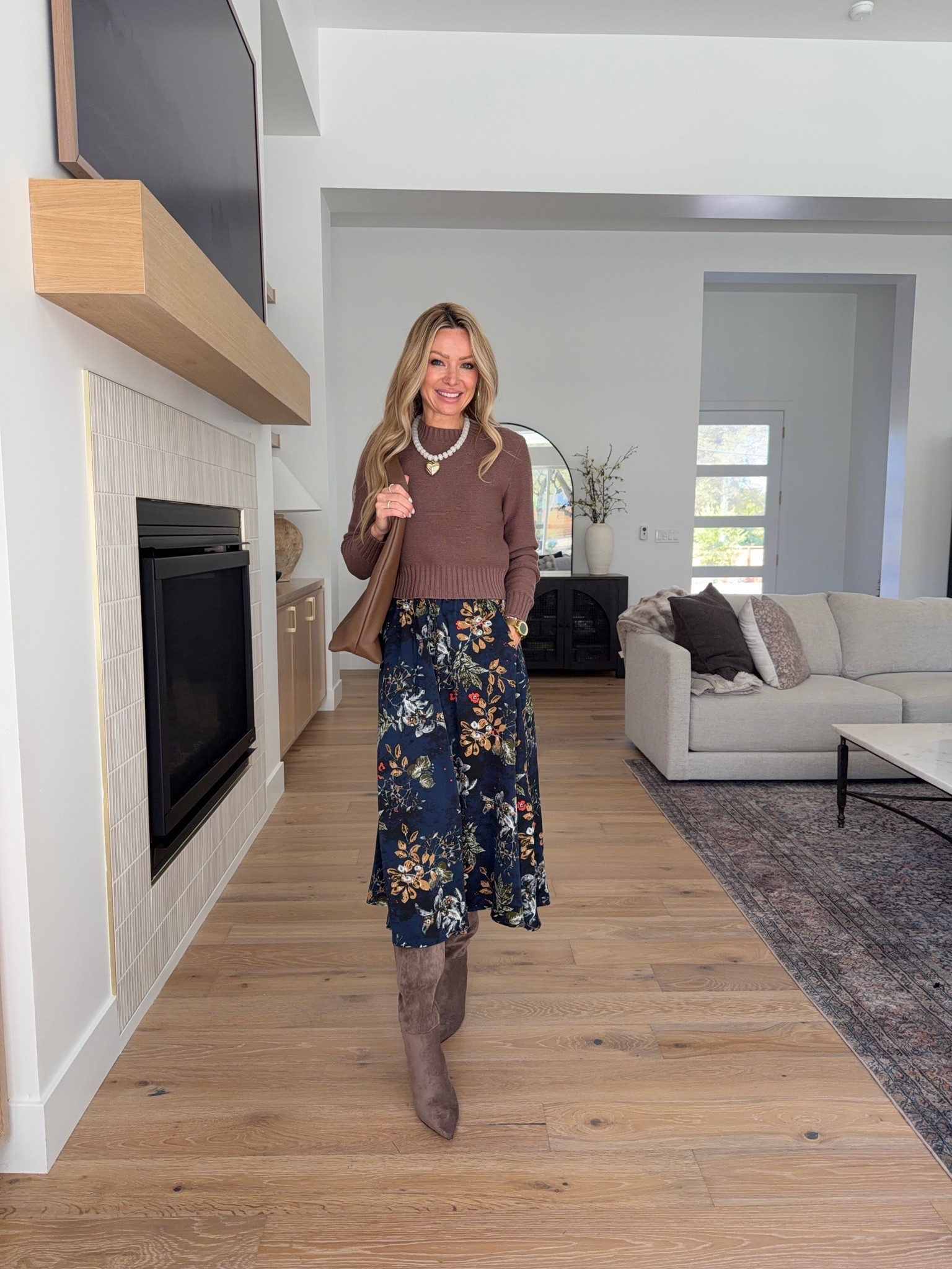 Amazon outfit idea if you want more outfits from fewer pieces. 🤎 comment AMAZON and I’ll send you tbr details 

Instead of buying something that only works one way, I love finding one piece I can style over and over — and this floral skirt is exactly that.

I paired it with a sweater and boots, a simple tank and jacket, an easy sweater-over-the-shoulders look, a fitted button-front top with denim, and even a basic tee for the most casual version.

Same skirt, five completely different outfits — which means less standing in your closet thinking you have “nothing to wear” and more mileage out of the pieces you already own.

Which styling is your favorite?

#amazonfashion #amazonoutfits #falloutfits #amazonfinds #affordablefashion