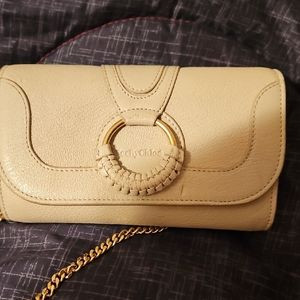 Elegant Cream and Gold Wristlet with Circular Closure | Poshmark