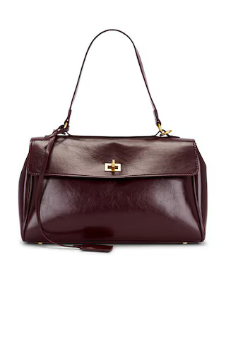 Locked in Traveller Shoulder Bag | Revolve Clothing (Global)