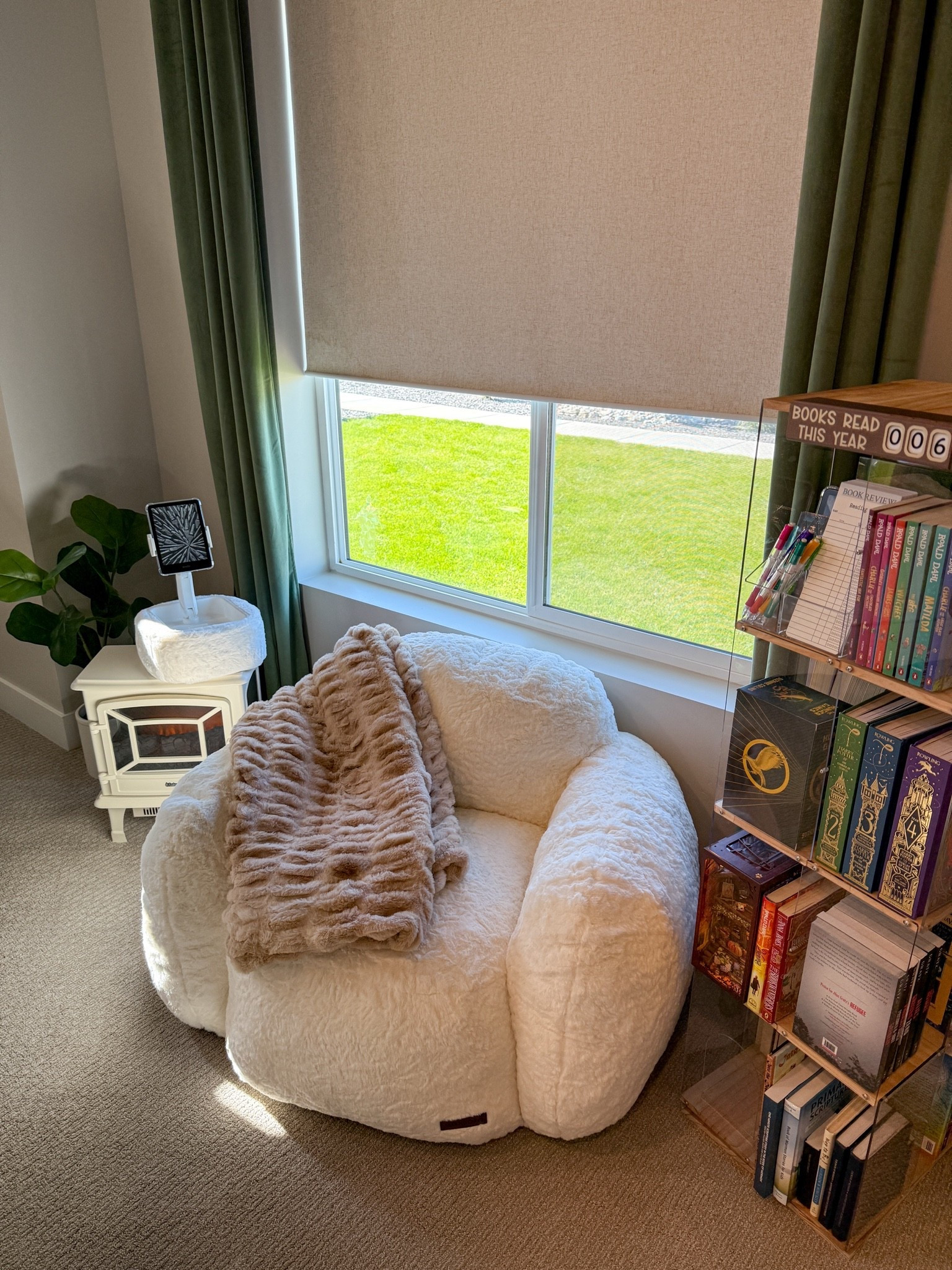 This cozy little reading corner might be my favorite spot in the room. The oversized sherpa chair, soft throw blanket, and easy-access bookshelf make it the perfect place for reading, relaxing, and winding down at the end of the day. Sharing all the pieces that helped create this cozy corner! #LTKHome #KidsRoomDecor #ReadingNook #CozyHome #BedroomInspo #HomeDecorFinds

#LTKSeasonal #LTKHome