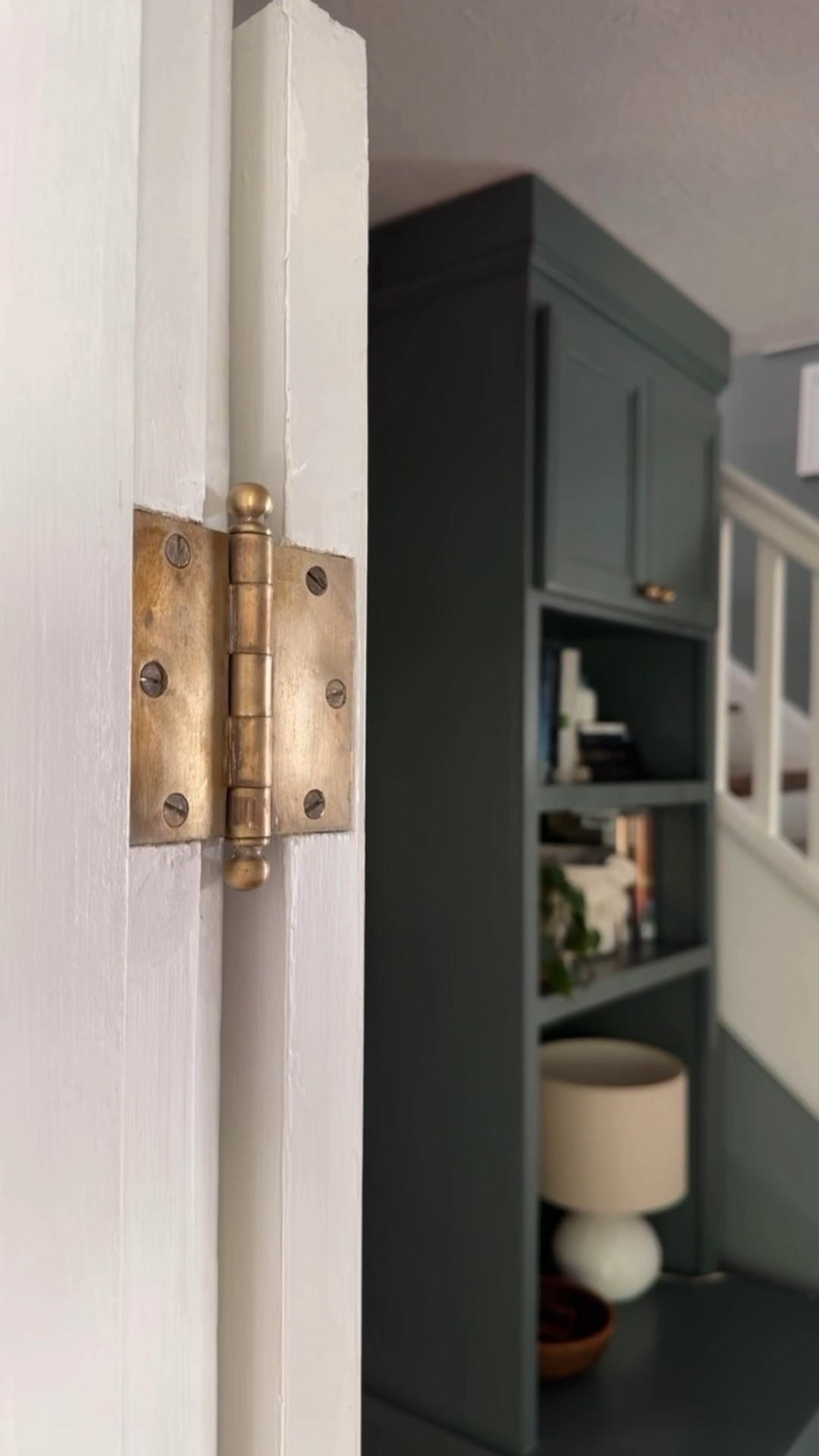 The *Reverse* Landlord Special
1) cook painted hinges in crockpot with just water (cook on LOW overnight is best) *do not reuse slow cooker for food
2) scrub with Barkeeper’s friend
3) optional: use brasso if you want them shiny & “new” looking, I did not use brasso here 
4) optional: spray with a clear lacquer spray to prevent tarnish and/or rust