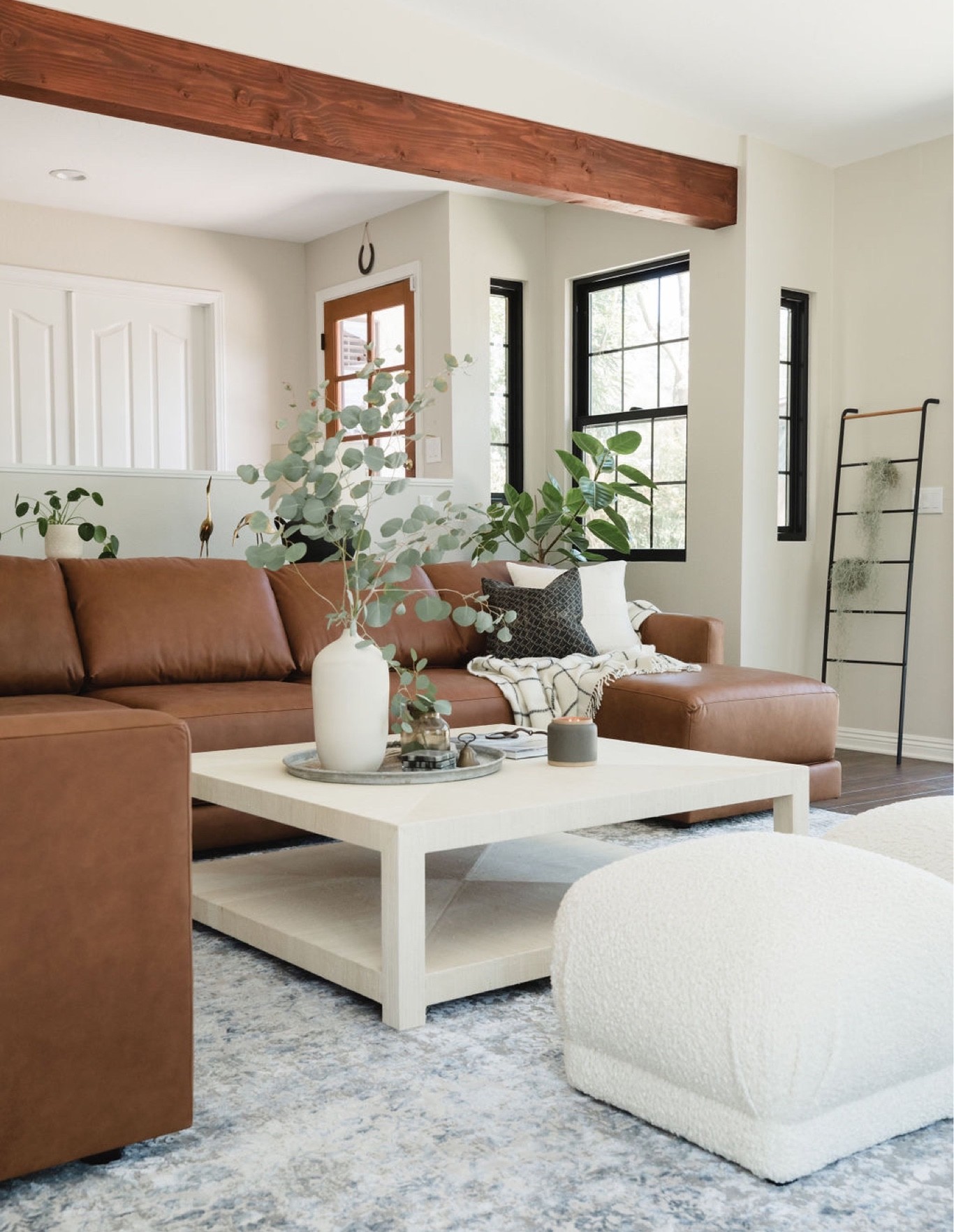 Modern farmhouse living room decor! #farmhouse #farmhousestyle #farmhousedecor #livingroom #livingroomdecor #farmhouselivingroom #leathersectional #leathersofa 

#LTKhome