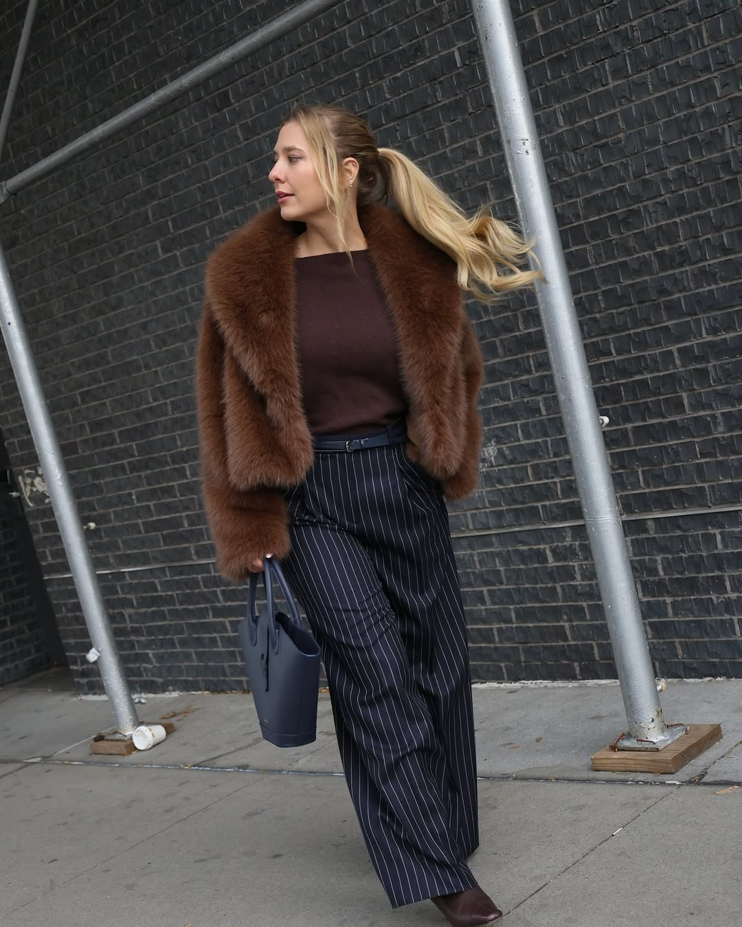 The Faux Fur & Pinstripe Mix, Luxe faux fur meets sharp navy pinstripes for the ultimate city chic. #FauxFur #StreetStyle #WinterOutfits 

 #LTKdayinmylife #LTKootd #LTKSaleAlert
