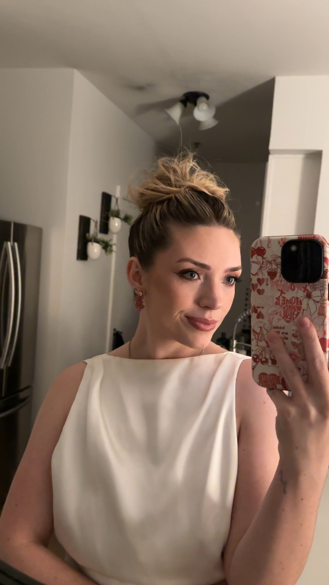 updo, glowy makeup, and pink earrings for our GNO 🌙

#LTKBeauty