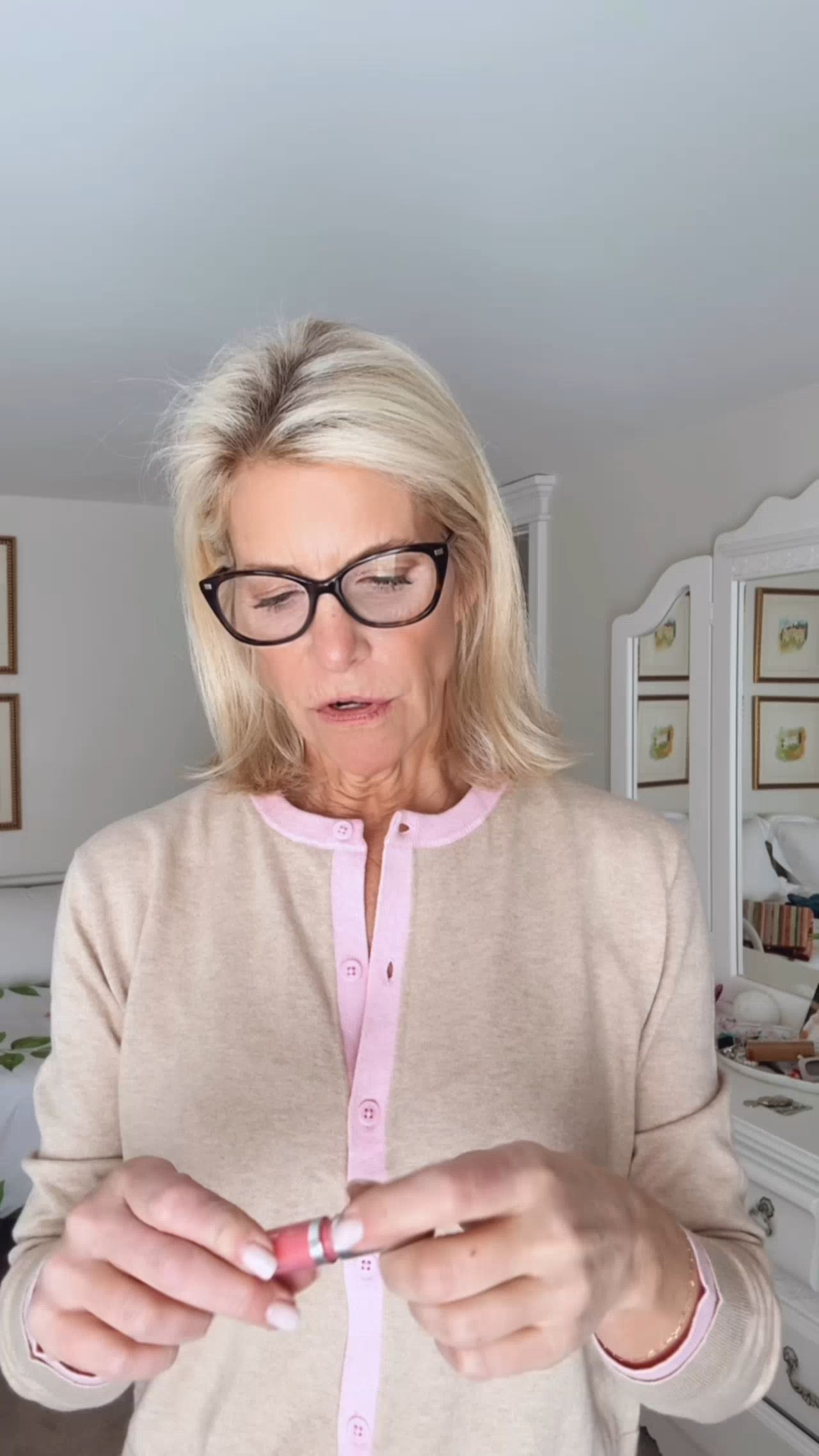 Greatest little beige and pink cardigan that is perfect for Spring. I love this color combo! 

 #LTKootd #LTKOver40 #LTKTravel