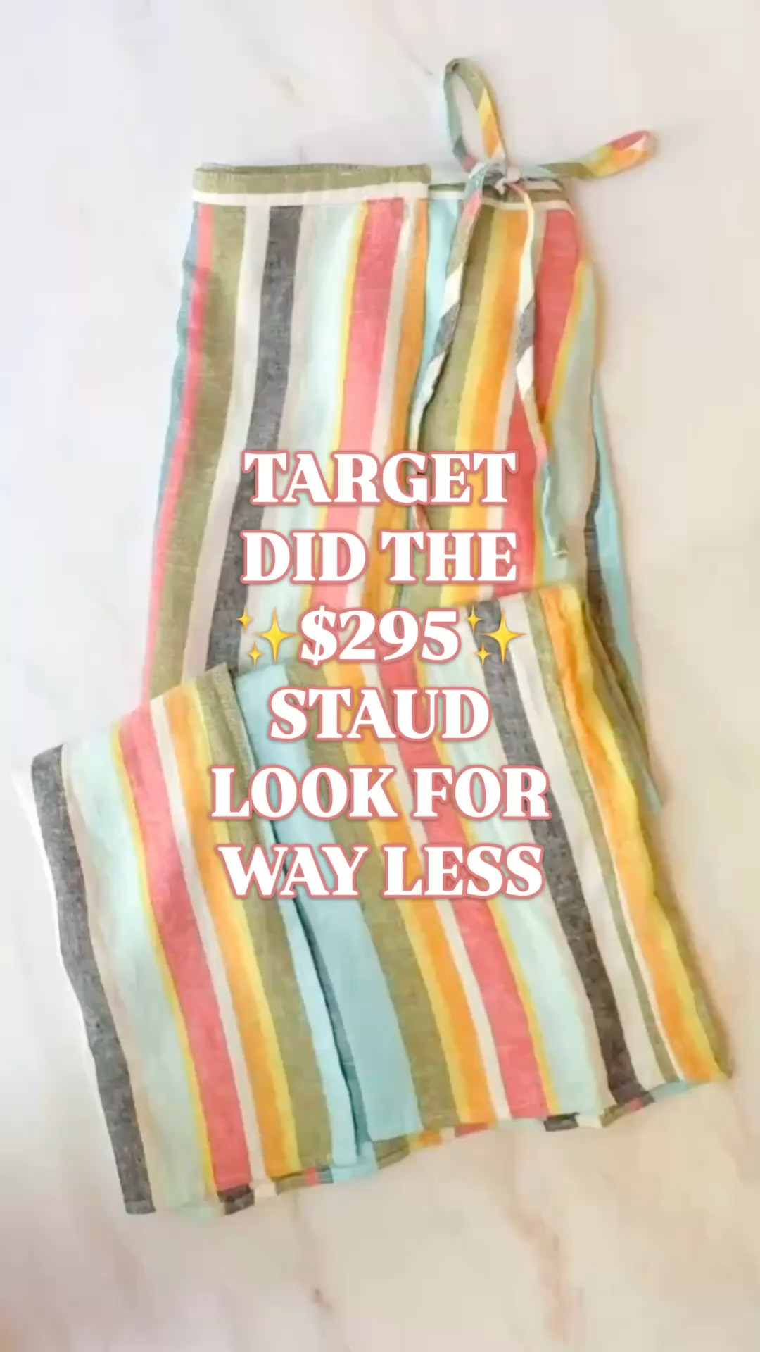 Staud Kaitlin skirt look for less | Target linen skirt | striped midi skirt | summer skirt outfit | designer look for less

This Target striped midi wrap skirt is giving the $295 Staud Kaitlin linen skirt look for less, and it is on sale for $18 right now.

It is also a Target bestseller with 1K+ bought last month, so this is exactly the kind of Target fashion find that usually starts moving fast once people realize what it looks like.

The colorful vertical stripes, wrap silhouette, side-tie closure, high-rise fit, midi length, and lightweight linen-rayon blend fabric make it such a strong summer skirt. It has that polished resort style feel but still works for everyday outfits, which is why this one is so good.

The fabric is 55% linen and 45% rayon, so it has that breezy woven feel you want for warm weather. Style it with a white tank, button down, fitted tee, swimsuit, sandals, raffia bag, gold jewelry, or simple summer top for an easy outfit that looks far more expensive than the Target price.

Wear it for vacation outfits, beach trips, resort lunches, summer dinners, brunch, church, teacher outfits, work outfits, casual office outfits, coastal shopping days, lake weekends, and everyday summer outfits.

Staud Kaitlin skirt look for less, Staud skirt look for less, Staud inspired skirt, Target skirt, Target midi skirt, Target fashion finds, Target new arrival, linen wrap skirt, striped midi skirt, colorful striped skirt, midi skirt women, wrap skirt women, high rise skirt, side tie skirt, linen rayon skirt, summer skirt outfit, vacation outfit, resort outfit, beach vacation outfit, teacher outfit, work outfit, designer look for less

#LTKFindsUnder50 #TargetStyle #TargetFinds #Staud #PreppyStyle #WorkOutfit #LookForLess #TeacherOutfit #SummerOutfits

#LTKWorkwear #LTKSaleAlert #LTKSeasonal