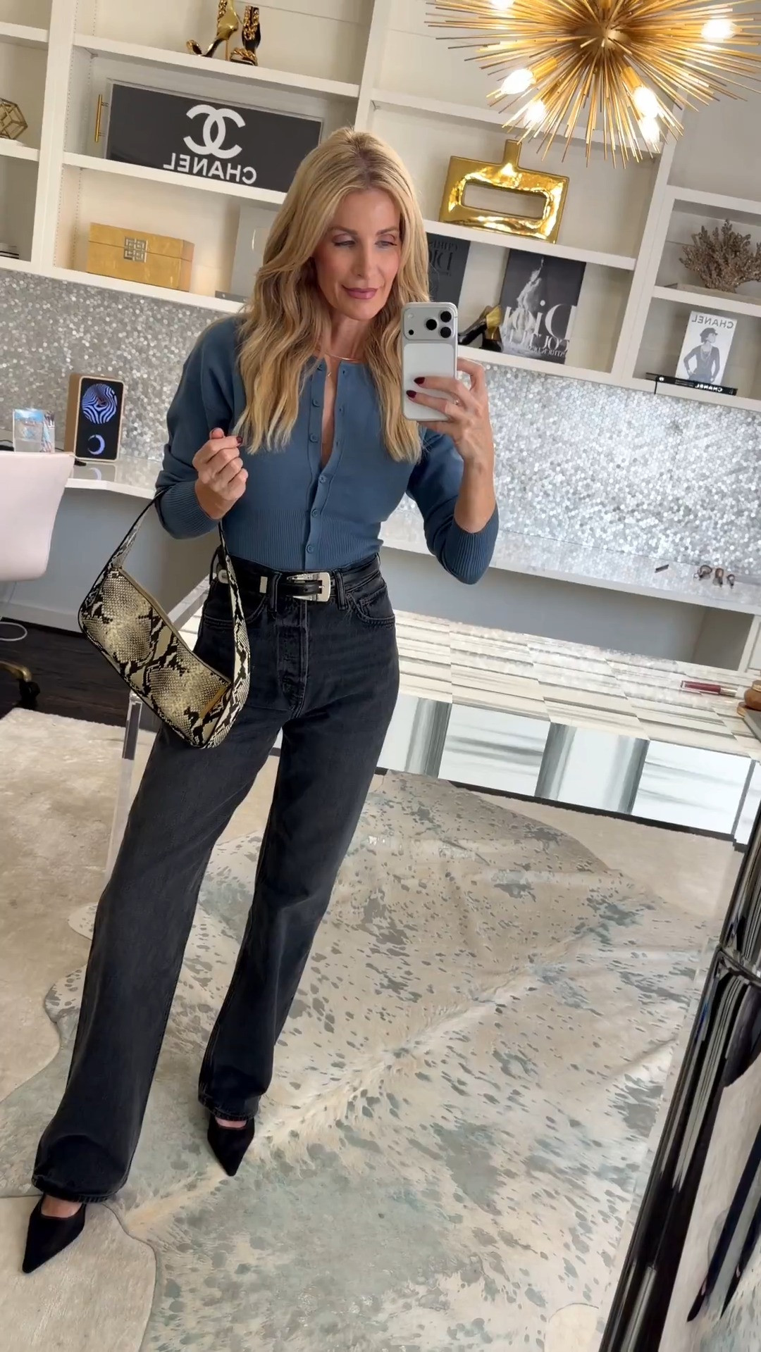 My new favorite fall transition outfit 💙 This fitted slate blue cardigan from Aritzia features a cinched waist that creates such a flattering silhouette, and I love leaving the top few buttons undone for an effortless vibe. I paired it with these new AGOLDE high-waisted wide-leg jeans in a faded black wash that goes with absolutely everything this season. Both fit true to size — I’m wearing an XS in the cardigan and a 24 in the denim. #EverydayStyle #AGOLDE #Aritzia #FallFashion 

#LTKOver40#LTKSeasonal#LTKOver40 

 

#LTKootd #LTKootd