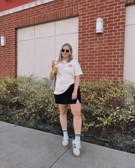 Casual midsize spring outfit - oversized graphic tee (size L), black mini skirt (linked similar), adidas sambas



#LTKstyletip #LTKcanada #LTKmidsize