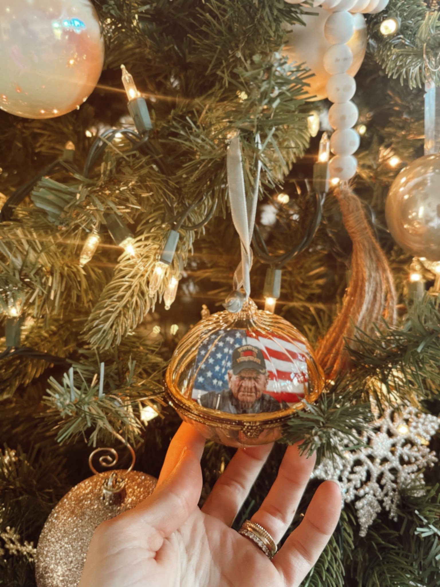 Such a fun way to showcase photos on your Christmas tree! Brads grandpa passed away at 99 this past year! So I found this ornament at @target and had to sang it to put poppies picture in 🥰✨🎄

#LTKHoliday #LTKGiftGuide #LTKdayinmylife