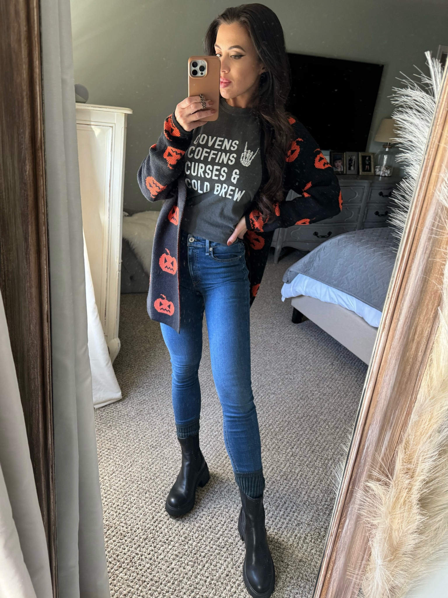 Halloween sweater. Halloween graphic tee. Skinny jeans. Chelsea boots. Haunted house outfit  

#LTKshoecrush #LTKHalloween #LTKfindsunder50